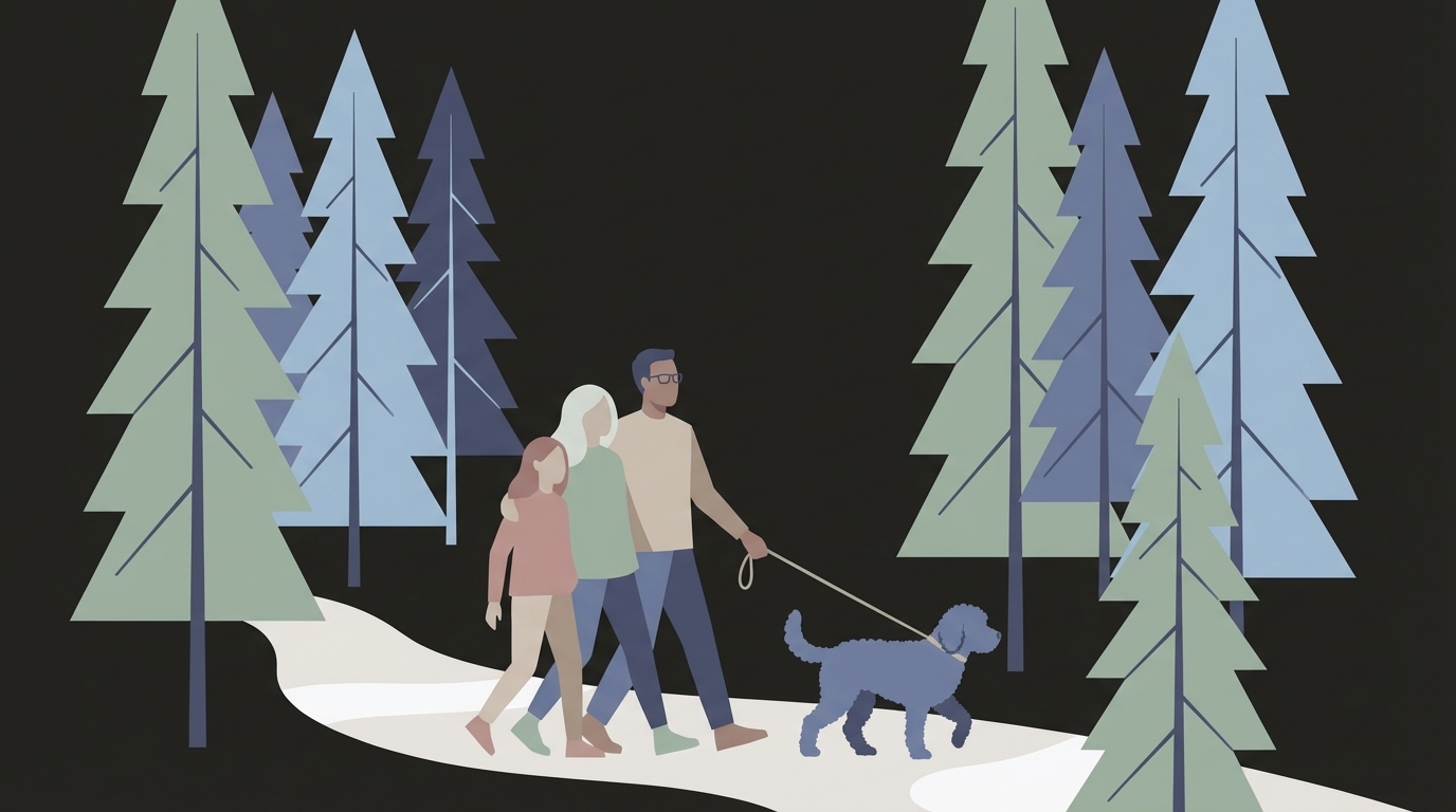 A family walking together on a forest trail; present, unhurried, grounded